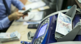 QNB Finansbank takipteki alacaklarını 3 varlık şirketine sattı